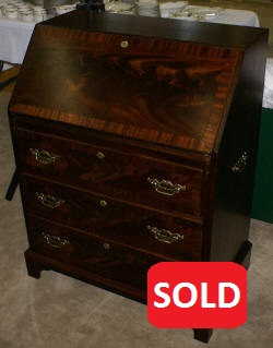 Serpentine front red mahogany Chippendale secretary desk