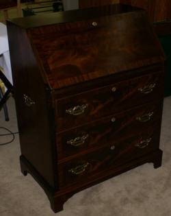 Serpentine front red mahogany Chippendale secretary desk