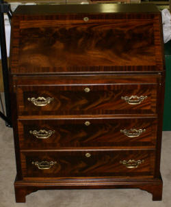 Serpentine front red mahogany Chippendale secretary desk