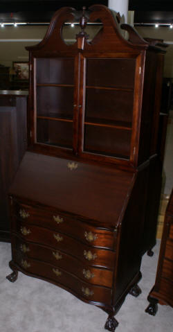 Serpentine front mahogany antique secretary desk