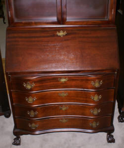 Serpentine front mahogany antique secretary desk