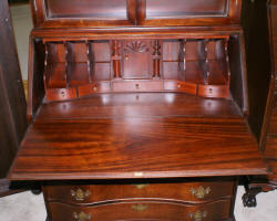 Serpentine front mahogany antique secretary desk