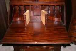 Serpentine front mahogany antique secretary desk