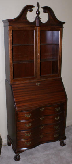 Serpentine front mahogany secretary desk