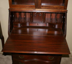 Serpentine front mahogany secretary desk