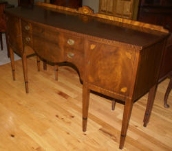 Inlaid bow front walnut sideboard