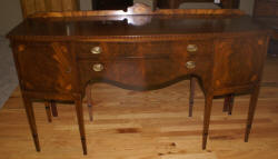 Inlaid bow front walnut sideboard