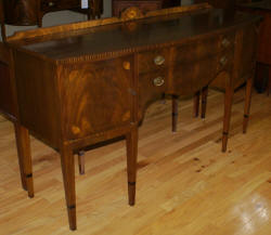 Inlaid bow front walnut sideboard