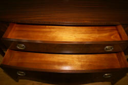 Inlaid bow front walnut sideboard