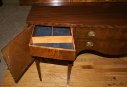 Inlaid bow front walnut sideboard