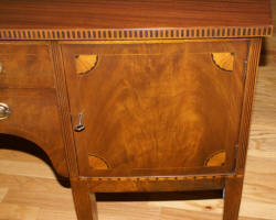 Inlaid bow front walnut sideboard