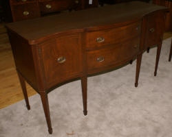 Inlaid serpentine front mahogany Hepplewhite sideboard