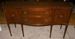 Inlaid serpentine front mahogany Hepplewhite sideboard