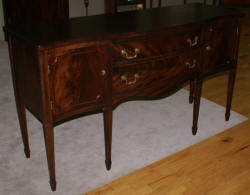 Mahogany antique serpentine front sideboard