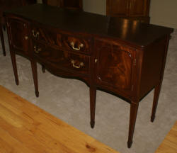 Mahogany antique serpentine front sideboard