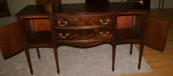 Mahogany antique serpentine front sideboard