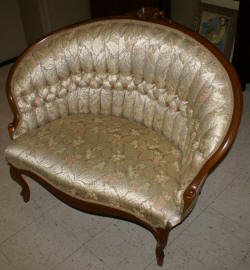 Balloon back mahgoany tufted settee