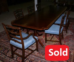 Banded inlaid modern mahogany dining room table with a set of 8 1940s ribbon back solid mahogany dining room chairs