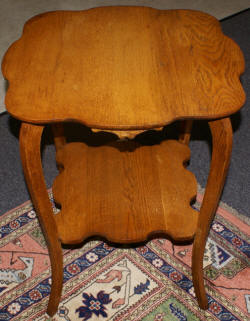 Antique solid oak scappled edge table