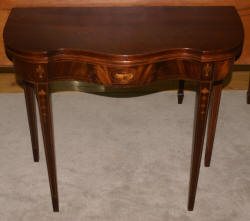 Mahogany urn inlaid antique flip top game table 