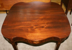 Mahogany urn inlaid antique flip top game table 