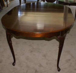 solid mahogany queen Anne dining room table 
