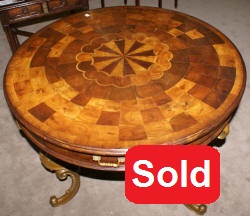 Jonathan Charles inlaid round Oyster veneer top table