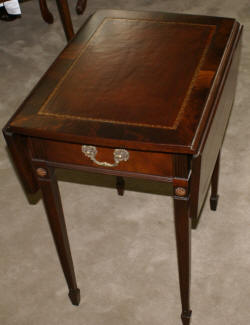 Flame mahogany leather top one drawer Pembroke table