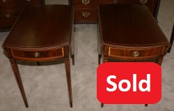 Matched pair of mahogany inlaid Pembroke tables 