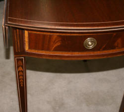 Matched pair of mahogany inlaid Pembroke tables 