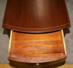 Matched pair of mahogany inlaid Pembroke tables 