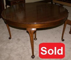 round walnut dining room table